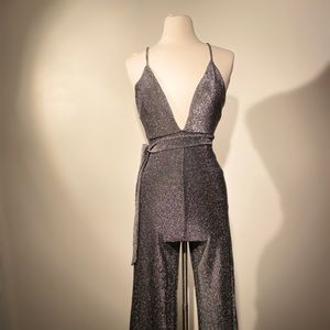 Forever 21 Dresses - Shut up & drive, Silver Shimmery Jumpsuit. Forever 21 Dresses - Shut up & drive, Silver Shimmery Jumpsuit.